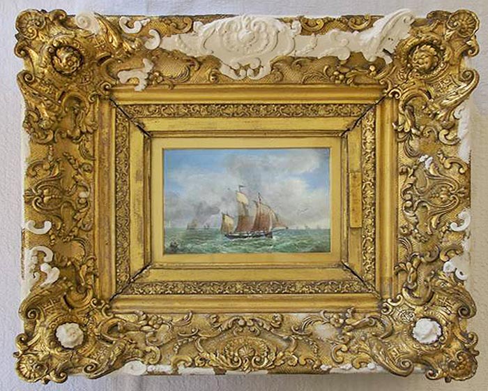 ornate-antique-picture-frame-being-restored