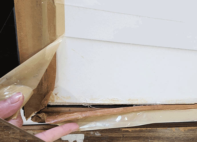 back-of-picture-frame-sealed-with-paqcking-tape